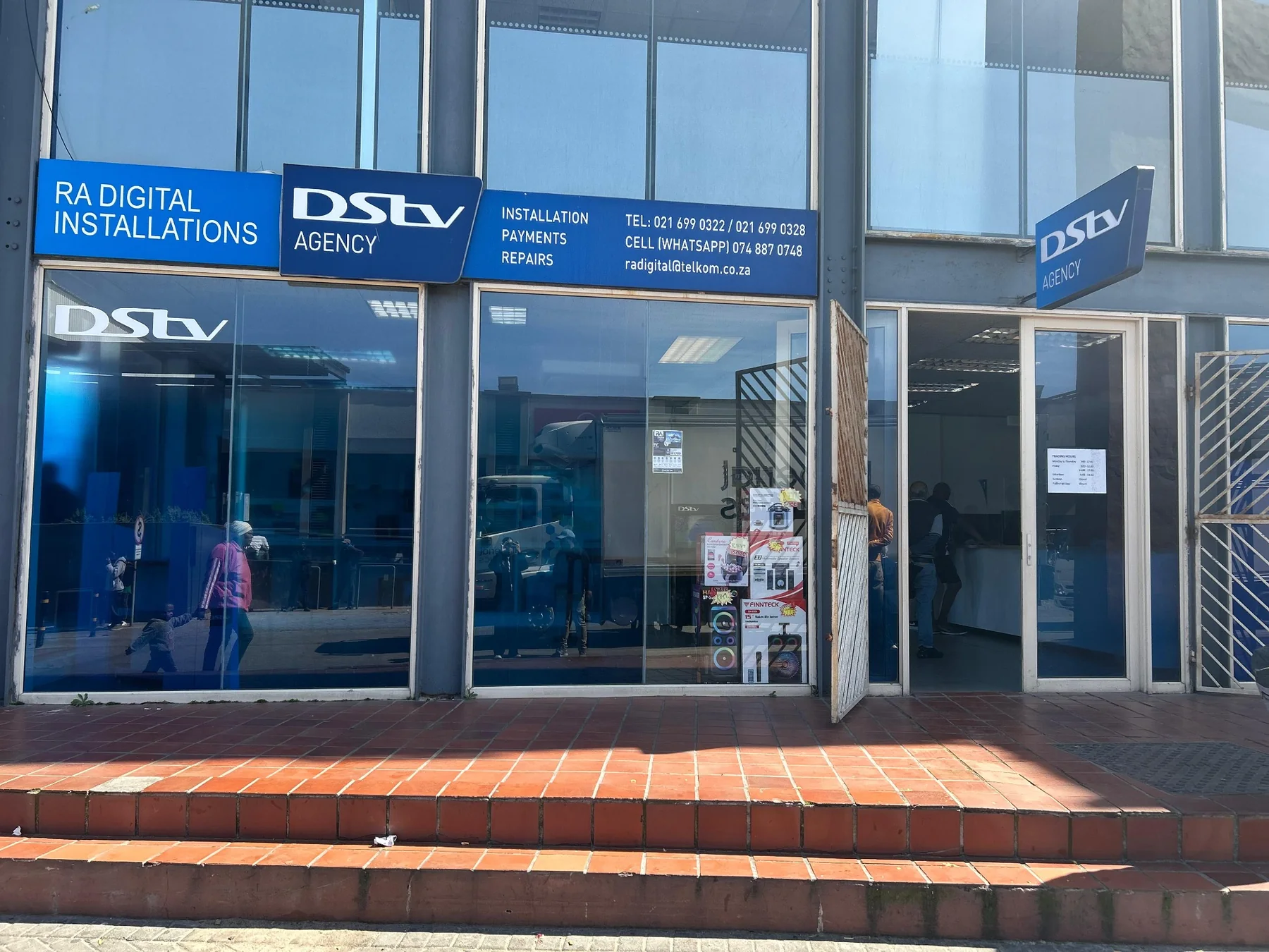 RA Digital Installations and DStv Agency storefront signage at Vangate Mall